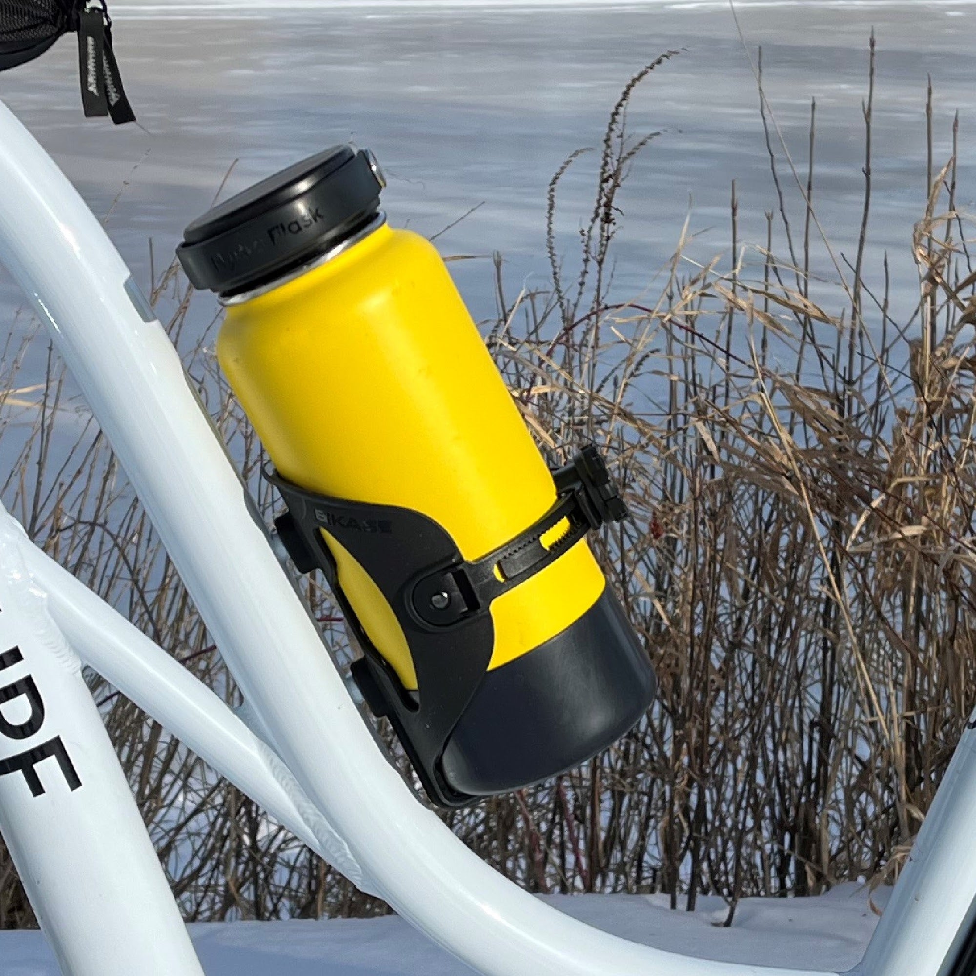 Water bottle and phone outlet holder for bike